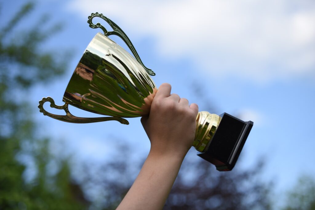 cup in the hand of a teenager against the blue sky 2024 11 25 14 26 54 utc